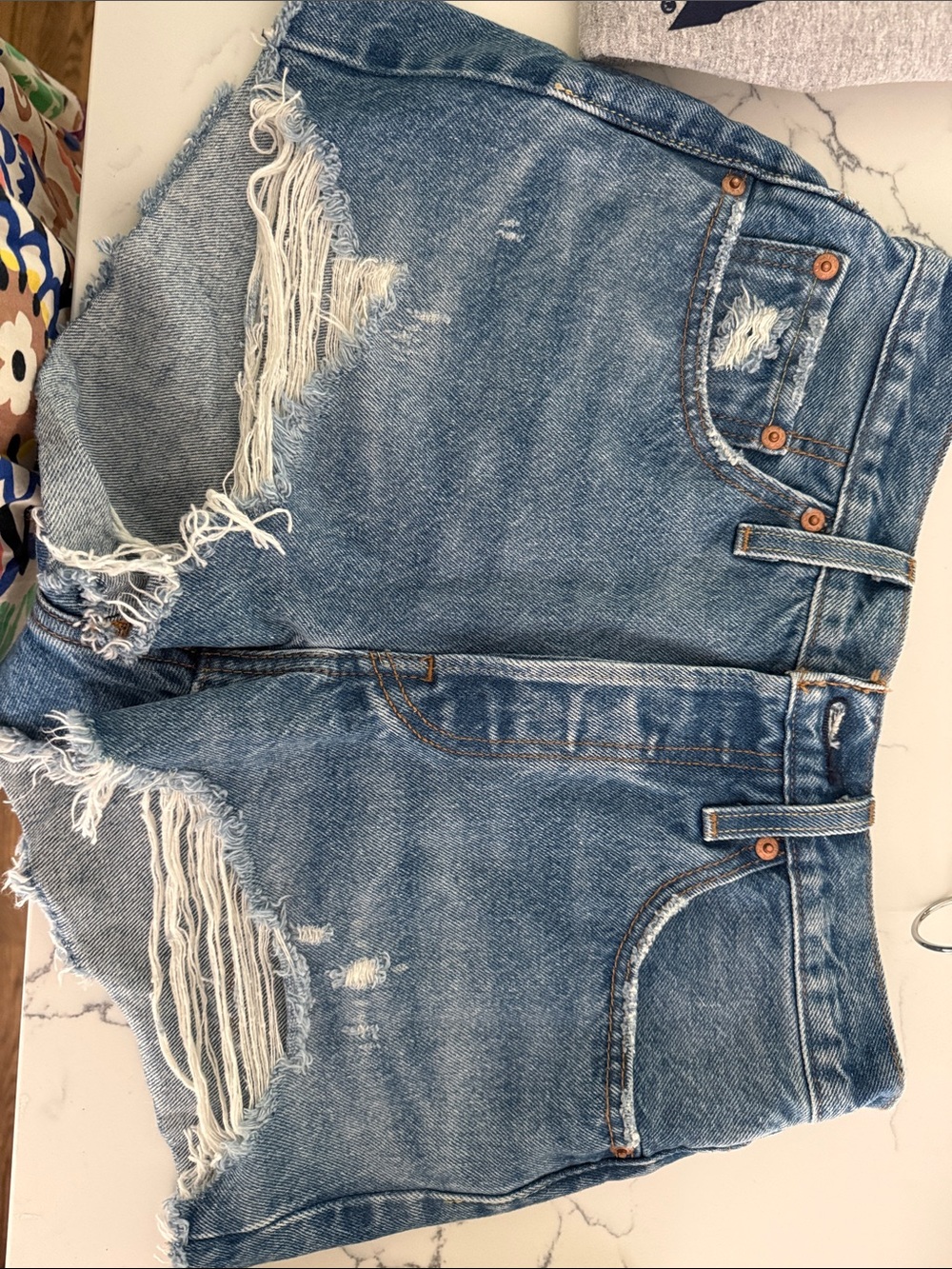Levi's Distressed Light Blue Denim Cutoff Shorts